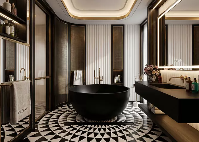 Luxury boutique hotel bathroom project featuring a striking matte black solid surface round freestanding bathtub paired with vintage geometric patterned floor tiles