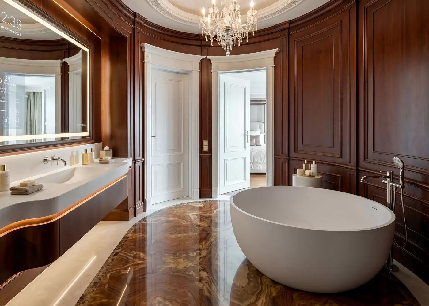 Classic vintage-luxury villa and boutique hotel bathroom with dark solid wood wall paneling paired with a pure white round solid surface freestanding bathtub